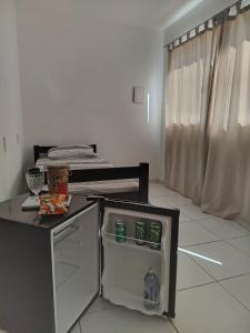 Kuchyň nebo kuchyňský kout v ubytování casa da tia Fabíola lugar de gente feliz