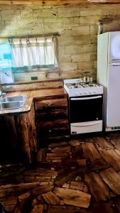 Köök või kööginurk majutusasutuses Cabañas Walwalün