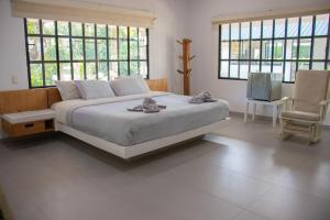 Voodi või voodid majutusasutuse Casa Finca Soluna toas