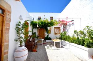 A garden outside Lindos Esel Suites
