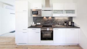 Kuchyň nebo kuchyňský kout v ubytování Ferienhaus Klopeiner See