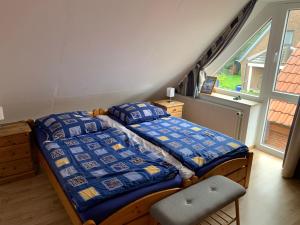 Postel nebo postele na pokoji v ubytování Baltic Joy