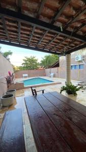 Bazén v ubytování Quartos em pousada disponivel na praia do futuro nebo v jeho okolí