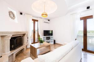 Μια τηλεόραση ή/και κέντρο ψυχαγωγίας στο Kampos Villa Iii