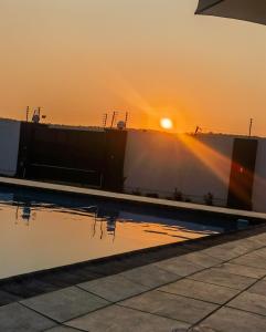 Východ nebo západ slunce při pohledu z apartmánu nebo okolí