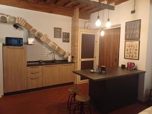 Kuchyň nebo kuchyňský kout v ubytování ACCANTO A MAILA - Appartamento caratteristico Toscano a soli 25 minuti da Firenze