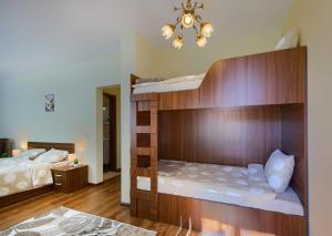 Ένα ή περισσότερα κρεβάτια σε δωμάτιο στο Rila North Samokov