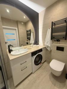 Koupelna v ubytování SeaForYou Apartment