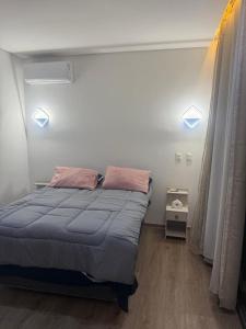 Ένα ή περισσότερα κρεβάτια σε δωμάτιο στο Casa com piscina no Reserva do Toque em Milagres +27 φωτογραφίες