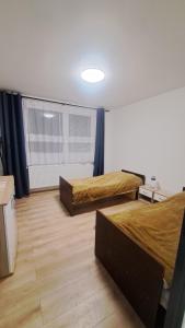 Postel nebo postele na pokoji v ubytování Apartmán Gerlach