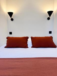 Ένα ή περισσότερα κρεβάτια σε δωμάτιο στο Casa Livia - studio design au coeur de Trouville