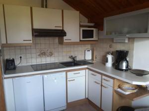 Kuchyň nebo kuchyňský kout v ubytování Ferienhaus Warmuth