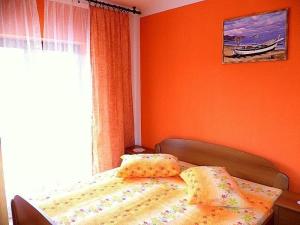 Ένα ή περισσότερα κρεβάτια σε δωμάτιο στο Apartments Vesna