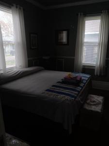 Ένα ή περισσότερα κρεβάτια σε δωμάτιο στο Angie's in the Heights