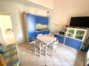 TV a/nebo společenská místnost v ubytování Villa Tahaa + 8 fotografií