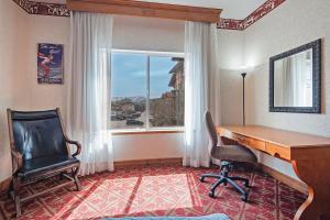 a room with a desk and a chair and a window at Spacious King Suite in the Heart of Midway Near Park City & Sundance Ski Resorts - 209 in Mound City +16 photos