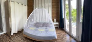 Postel nebo postele na pokoji v ubytování Cap Lodge Martinique