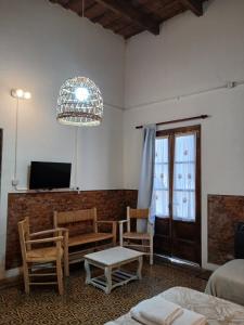 TV a/nebo společenská místnost v ubytování La Blanquita de Areco + 11 fotografií