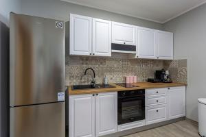 Kuchyň nebo kuchyňský kout v ubytování Ferienwohnung Anna In Lokve + 32 fotografií