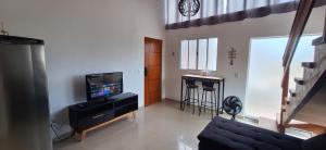 Μια τηλεόραση ή/και κέντρο ψυχαγωγίας στο Studio 23 da praia de Maresias