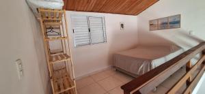 Ένα ή περισσότερα κρεβάτια σε δωμάτιο στο Studio 23 da praia de Maresias +23 φωτογραφίες