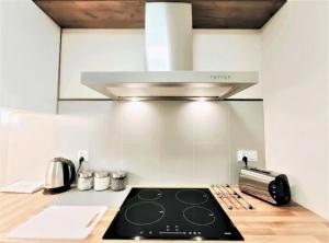 Kuchyň nebo kuchyňský kout v ubytování Zefiro Ogrody