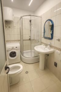 Koupelna v ubytování H&G Seaview Apartments + 15 fotografií