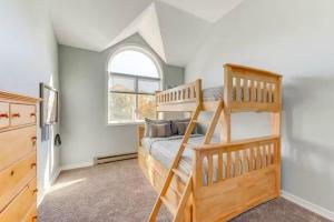 a bedroom with two bunk beds and a window at Lake and Ski Escape with Hot Tub Coming Soon in Lake Harmony +35 photos