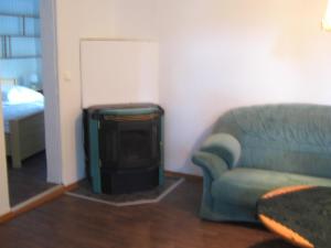 Posezení v ubytování Kinkerbungalow