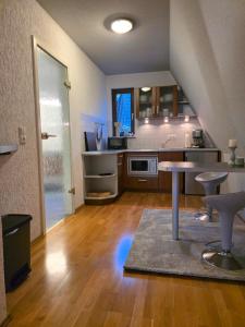 Η κουζίνα ή μικρή κουζίνα στο Atelierwohnung eines Fischers