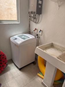 Giường trong phòng chung tại Marina Diamante con Rooftop y Jacuzzi +12 ảnh