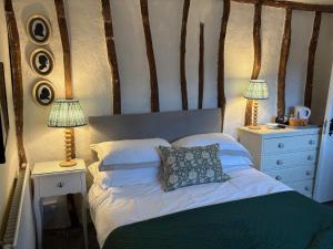 Ένα ή περισσότερα κρεβάτια σε δωμάτιο στο The Swan Inn