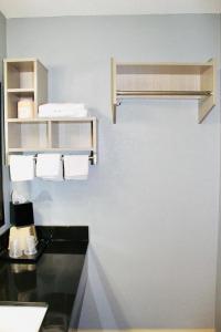 Kuchyň nebo kuchyňský kout v ubytování Milan inn & Suites