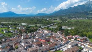 an aerial view of a town in the mountains at Locanda Antica Bribano in Sedico