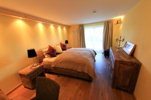 Postel nebo postele na pokoji v ubytování Ferienwohnung Villa Albatros In Oberdellach