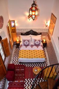 En eller flere senge i et værelse på Riad Dar Salma