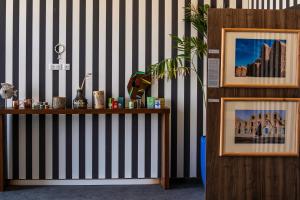 a room with black and white stripes on a wall at Z Hotel Sfax in Sfax