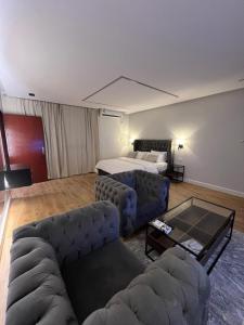 Кровать или кровати в номере استديو النورس 1 -بتصميم عصري بـ دخول ذاتي