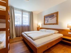 Postel nebo postele na pokoji v ubytování Residenz Wildkogelbahn Top 4