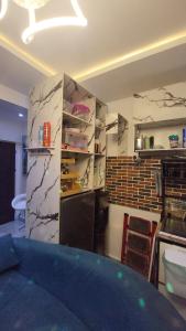 Una cocina o kitchenette en AP WorkandStay