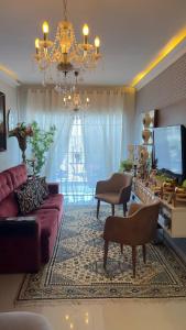 TV a/nebo společenská místnost v ubytování Apartamento Waldo Pinheiro