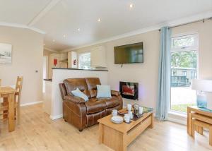 Televiisor ja/või meelelahutuskeskus majutusasutuses Bainbridge Ings +10 fotot