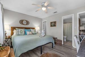 Postel nebo postele na pokoji v ubytování Palm & Pearl