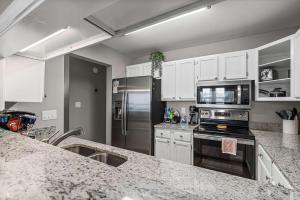 Kuchyň nebo kuchyňský kout v ubytování Palm & Pearl + 21 fotografií