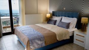 Ένα ή περισσότερα κρεβάτια σε δωμάτιο στο Ferienwohnung Für 8 Personen In Agia Pelagia, Kreta +32 φωτογραφίες