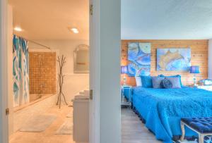 Postel nebo postele na pokoji v ubytování Whales Song