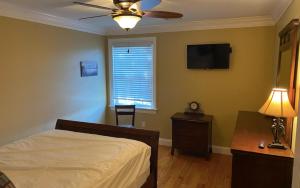 Ένα ή περισσότερα κρεβάτια σε δωμάτιο στο Cal56Right