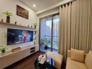 TV a/nebo společenská místnost v ubytování Linen