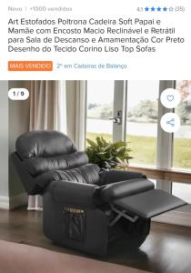 a black reclining chair in a room with a window at Quarto com ar condicionado tv para uma pessoa in Passo Fundo