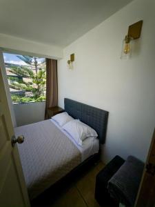 Postel nebo postele na pokoji v ubytování Duplex en el centro!!